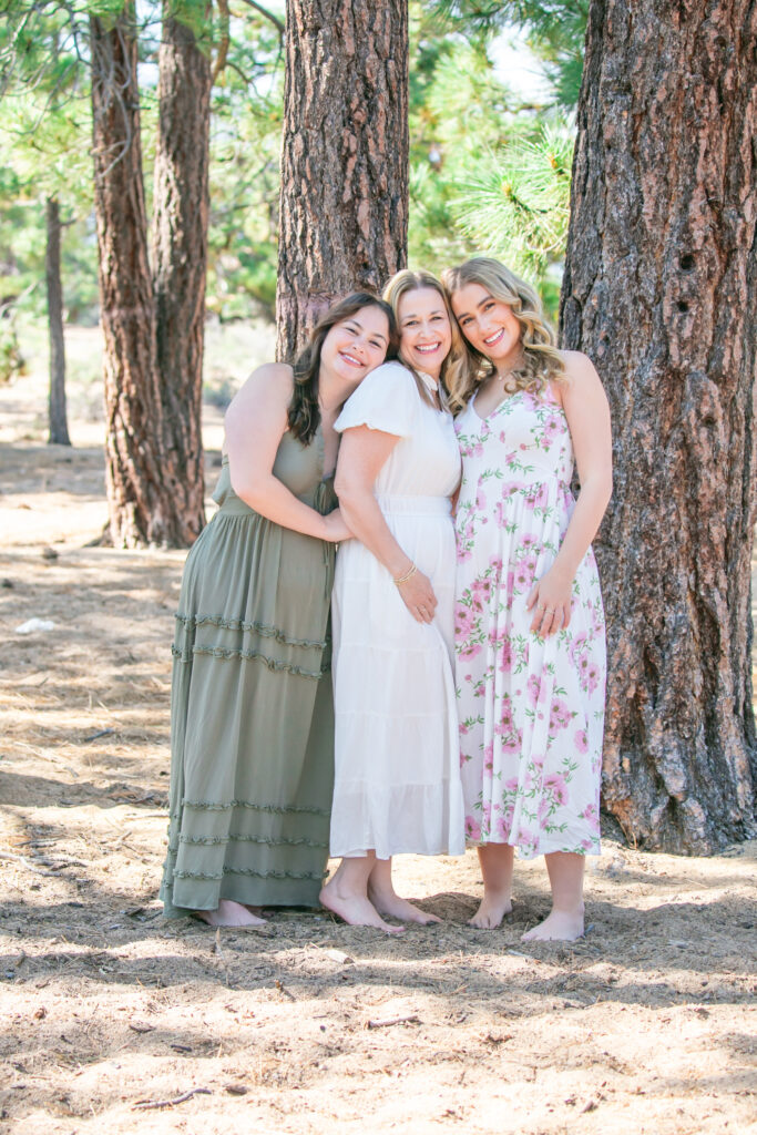 three generations of women on a lake Tahoe beach