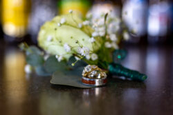 the rings and the boutonnieres before the ceremony at Wild River Grille at the river Walk in downtown Reno